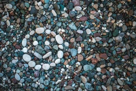 Smiling smiley face lined with white stones on the beach, the concept of rela Stock Photos