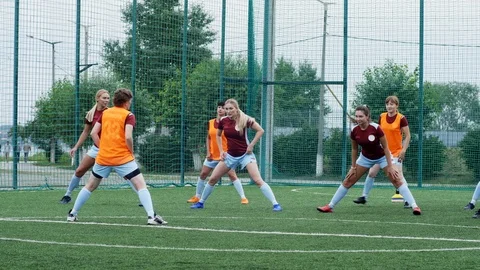 Smiling soccer team warming up on training Stockbeeldmateriaal 117136742