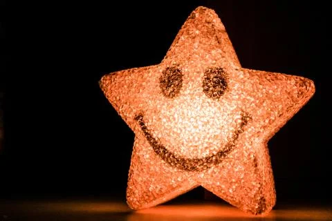 Smiling star shining Stock Photos