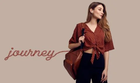 Smiling student hipster girl with backpack going on a vacation Stock Photos