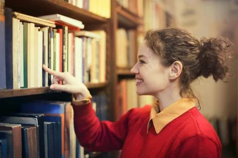 Smiling student in the library Stock Photos