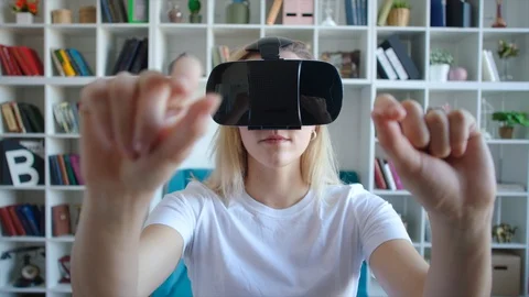 Smiling student preparing for exam using VR glasses, modern information Stock Footage 104460145