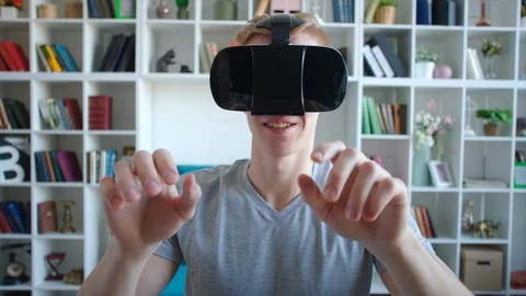 Smiling student preparing for exam using VR glasses, modern information Stock Footage 104460478
