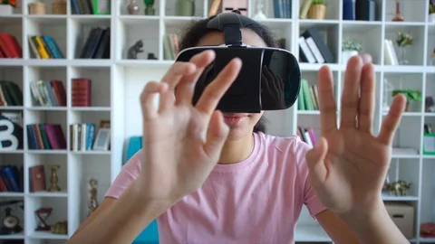 Smiling student preparing for exam using VR glasses, modern information Stock Footage 104461127