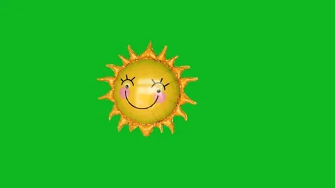 Smiling sun foil balloon swaying left and right on green screen. Video stock 343095651
