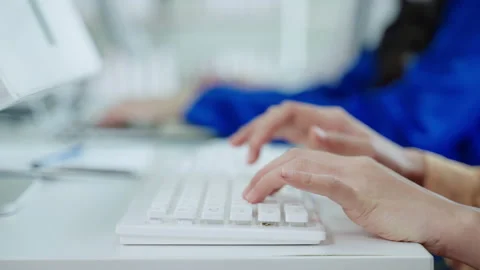 Smiling supervisor teaching to his team of operator team agent Stock Footage 157134419