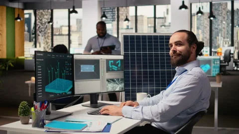 Smiling sustainability specialist develops clean energy solutions Video stock 315615064