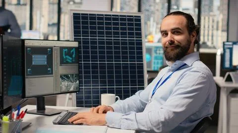 Smiling sustainability specialist develops clean energy solutions Stock Photos