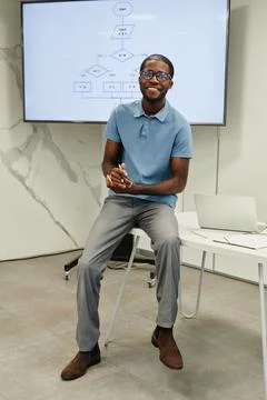 Smiling Teacher in Coding Class Stock Photos