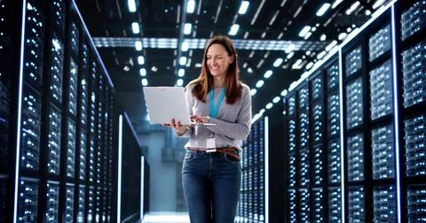 Smiling tech expert setting up artificial intelligence Stock Photos