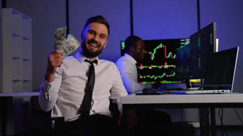 Smiling trader counting money after cryptocurrency market profits Stock Footage 305018341