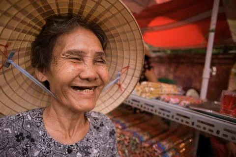 Smiling traditional Vietnamese woman Stock Photos