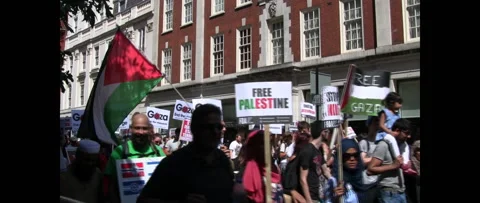Smiling Walking Protesters Marching for Gaza on August 9 2014 London UK Stock Footage 144322680