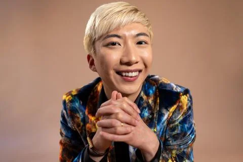 Smiling While Taking a Break in the Studio Fotos Stock