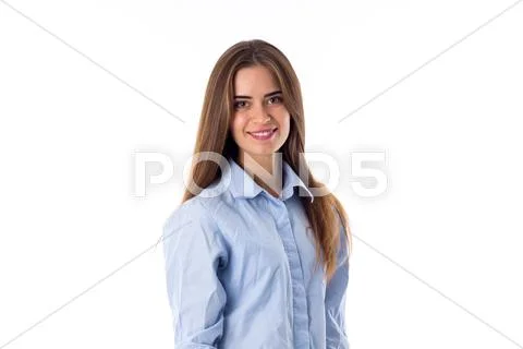 Smiling woman in blue shirt Stock Photos