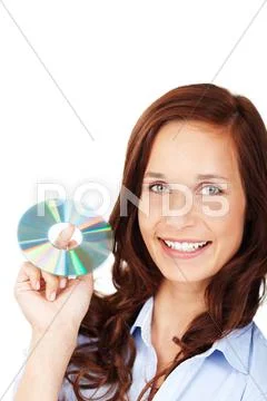 Smiling woman with a cd or dvd Stock Photos