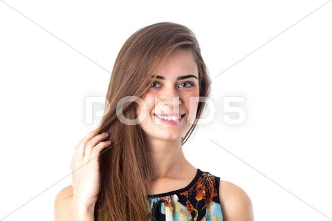 Smiling woman holding her hair Stock Photos