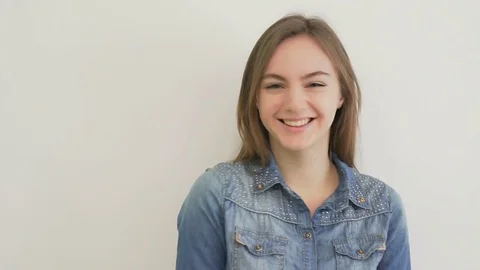 Smiling woman surprising with her mouth open Stock Footage