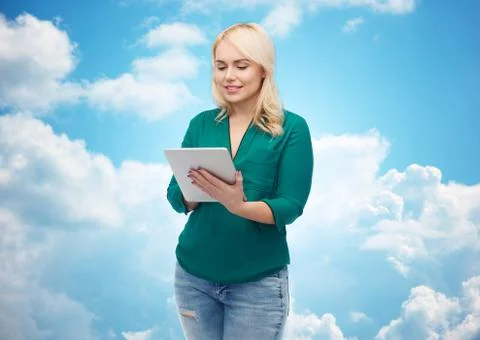 Smiling woman with tablet pc computer Stock Photos