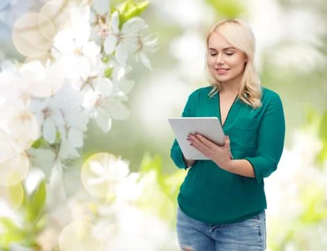 Smiling woman with tablet pc computer Stock Photos