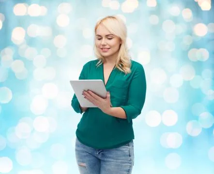 Smiling woman with tablet pc computer Stock Photos