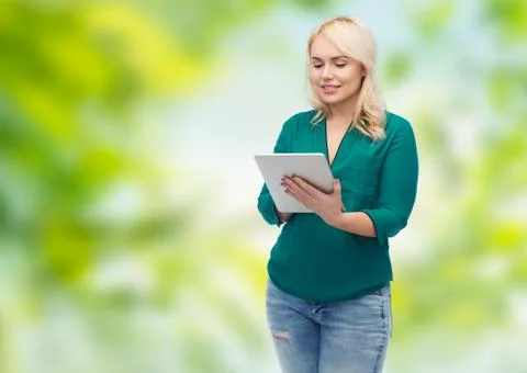 Smiling woman with tablet pc computer Stock Photos