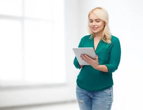 Smiling woman with tablet pc computer Stock Photos