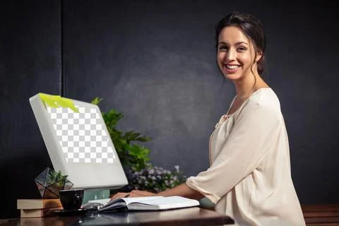 Smiling woman using a computer Stock Photos