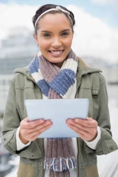 Smiling woman using tablet Stock Photos