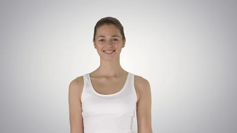 Smiling woman walking on gradient background. Stock Footage 102369341