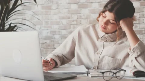 Smiling woman write notes watch webinar study work on laptop, young student  lea 库存影片 196464985