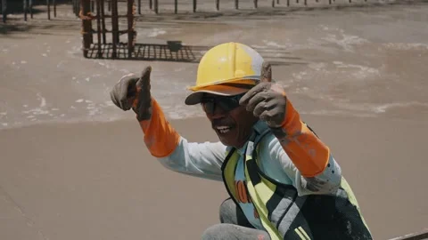 Smiling Worker Posing on Construction Site Thumbs Up Stock Footage 308910188