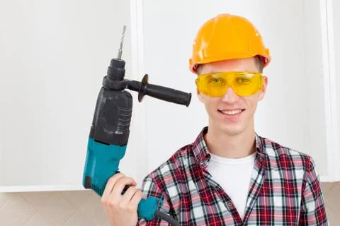 Smiling worker with rock-drill Stock Photos
