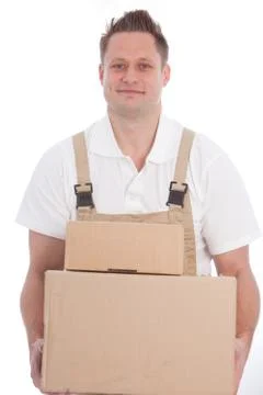 Smiling workman carrying boxes Stock Photos