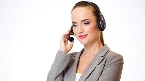Smiling young beauty in headset. Stock Footage 96299458