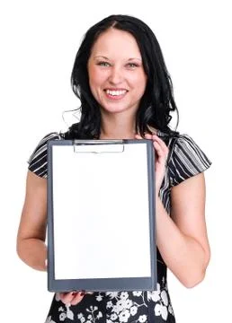Smiling young business woman showing blank signboard over white Stock Photos