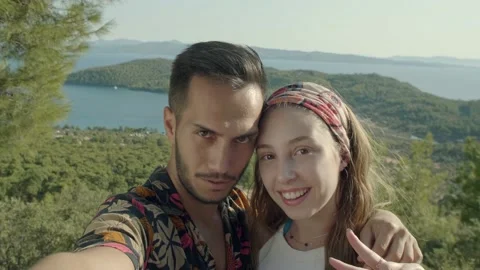 Smiling young couple making selfie on a sunny summer day. Stock Footage 144329587