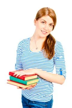 Smiling young female student with a stack of books Stock Photos