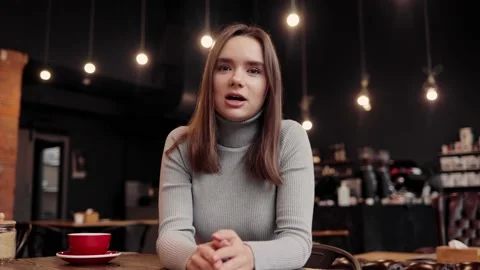 Smiling young female student talking to web camera. Recording vlog, online video Stock Footage 161720105