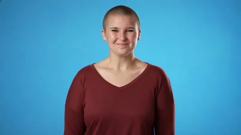 Smiling young gender fluid non binary woman 20s years old posing isolated on Stock Footage 222954531
