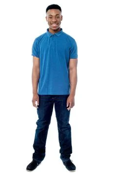 Smiling young guy over white background Stock Photos