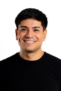 Smiling young latin man studio portrait Stock Photos