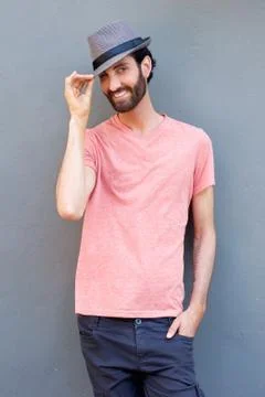 Smiling young man with hat Stock Photos