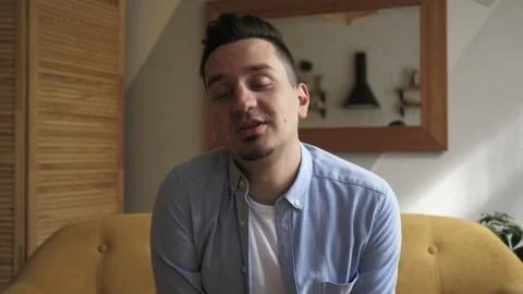 Smiling young man look at camera talk make live video conference Stock Footage 139628302