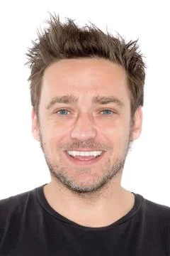 Smiling young man Stock Photos