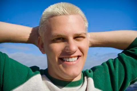 Smiling young man Stock Photos