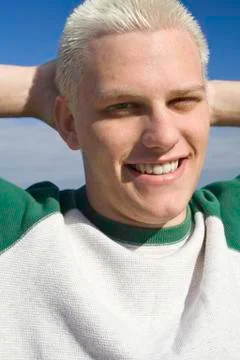 Smiling young man Stock Photos