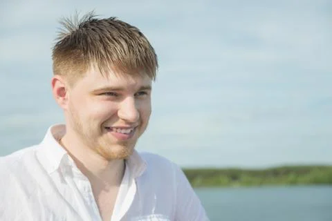 Smiling young man Stock-Fotos