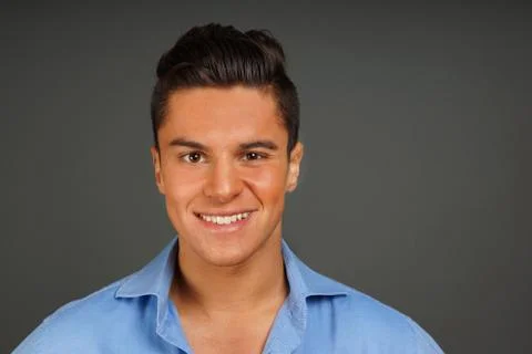 Smiling young man Stock Photos