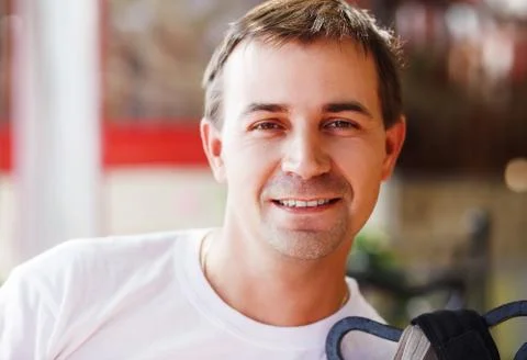 Smiling young man Stock Photos